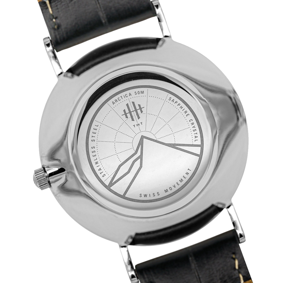 Back engraving of silver THT Arctica watch. Swiss watch movement.