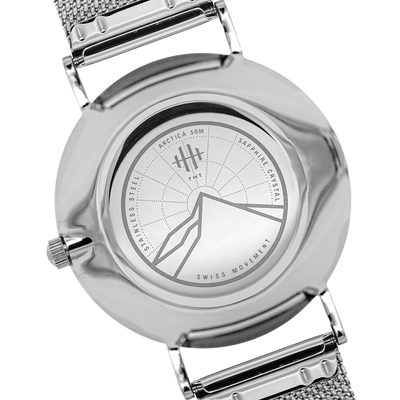 Back engraving of silver THT Arctica watch.